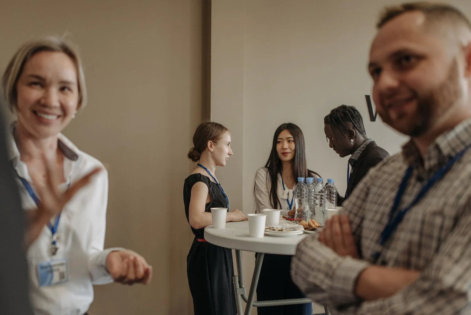 People discussing their businesses over coffee at an event